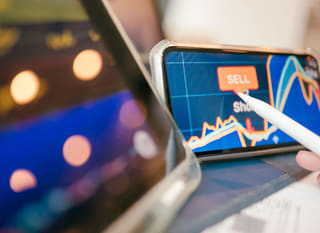 Trader working across multiple markets while analyzing forex options alongside Bitcoin and Ethereum
